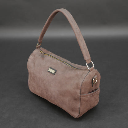 Choco cow Chelsea leather bag with zip compartments and pockets.