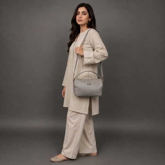 Silver cow Chelsea leather bag with zip closure, multiple pockets, and durable everyday design.
