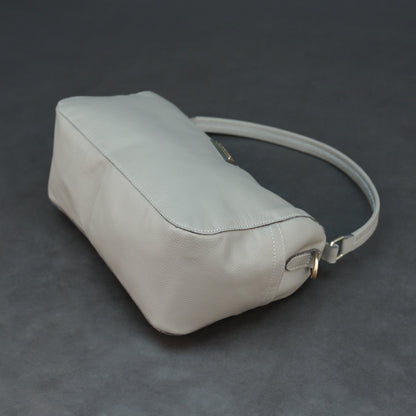 Silver cow Chelsea leather bag with zip closure, multiple pockets, and durable everyday design.