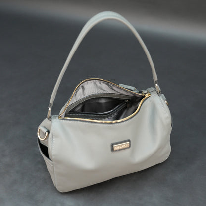 Silver cow Chelsea leather bag with zip closure, multiple pockets, and durable everyday design.
