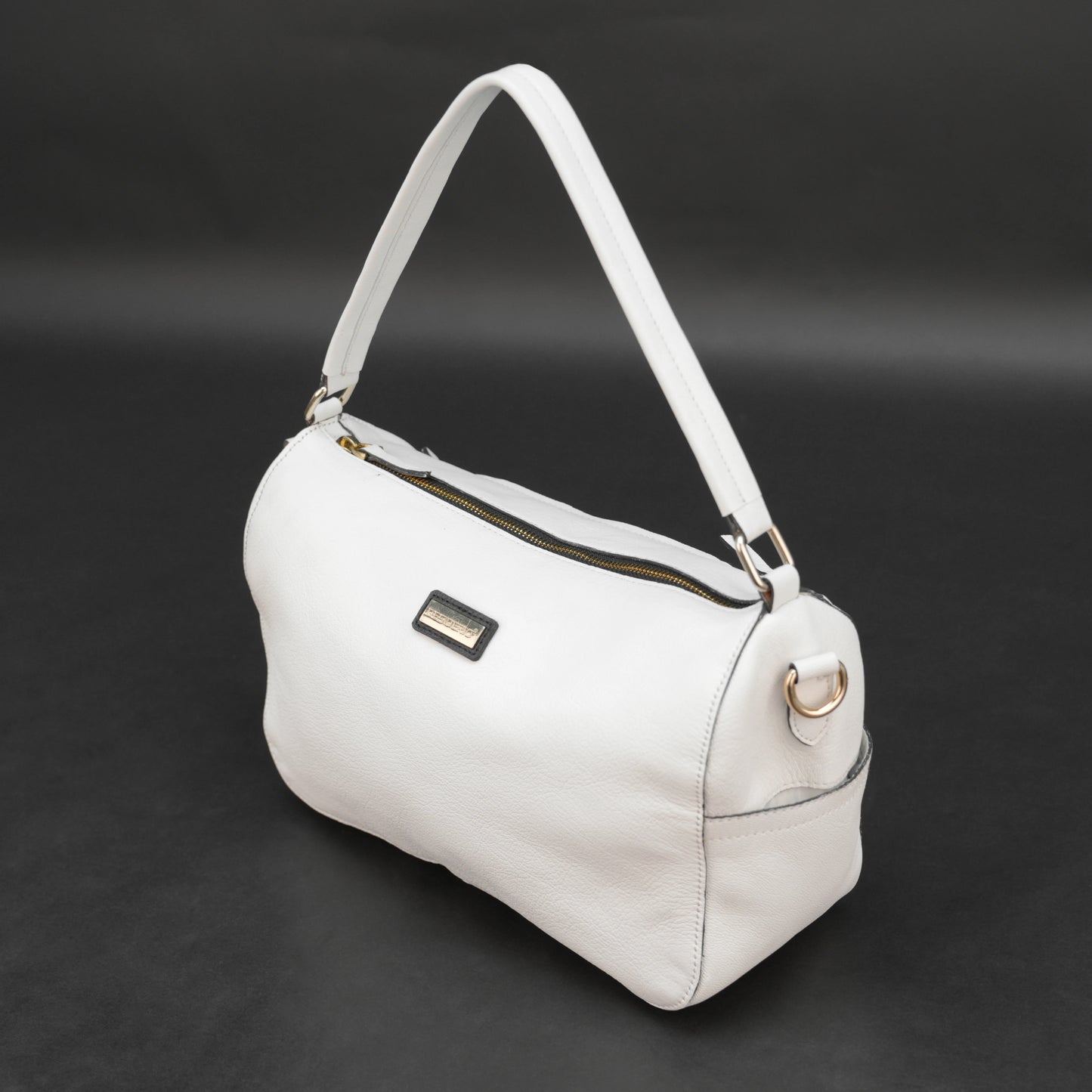 White goat leather bag with zip closure, multiple pockets, and durable everyday design.