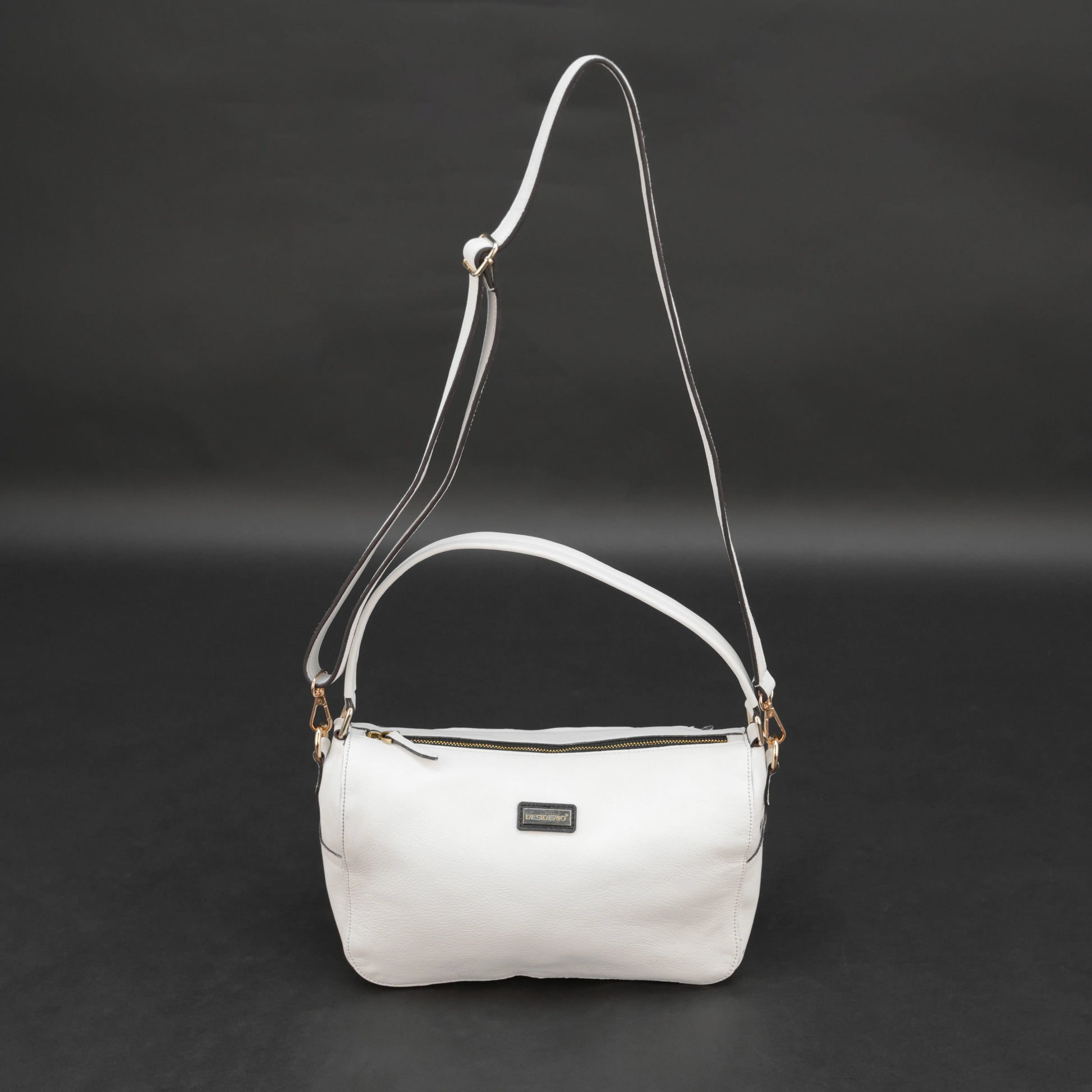 White goat leather bag with zip closure, multiple pockets, and durable everyday design.