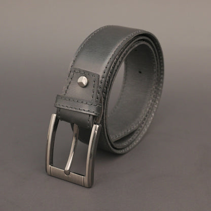 Premium leather belt with solid one-piece construction, charcoal metal buckle, durable, adjustable, stylish for jeans and dress wear