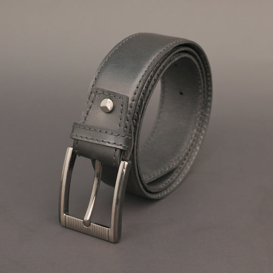 Premium leather belt with solid one-piece construction, charcoal metal buckle, durable, adjustable, stylish for jeans and dress wear
