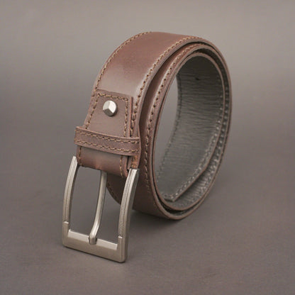 Premium leather belt with solid one-piece construction, charcoal metal buckle, durable, adjustable, stylish for jeans and dress wear