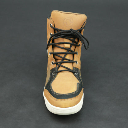 Tan and black motorbike boots with mesh panels and white sole.