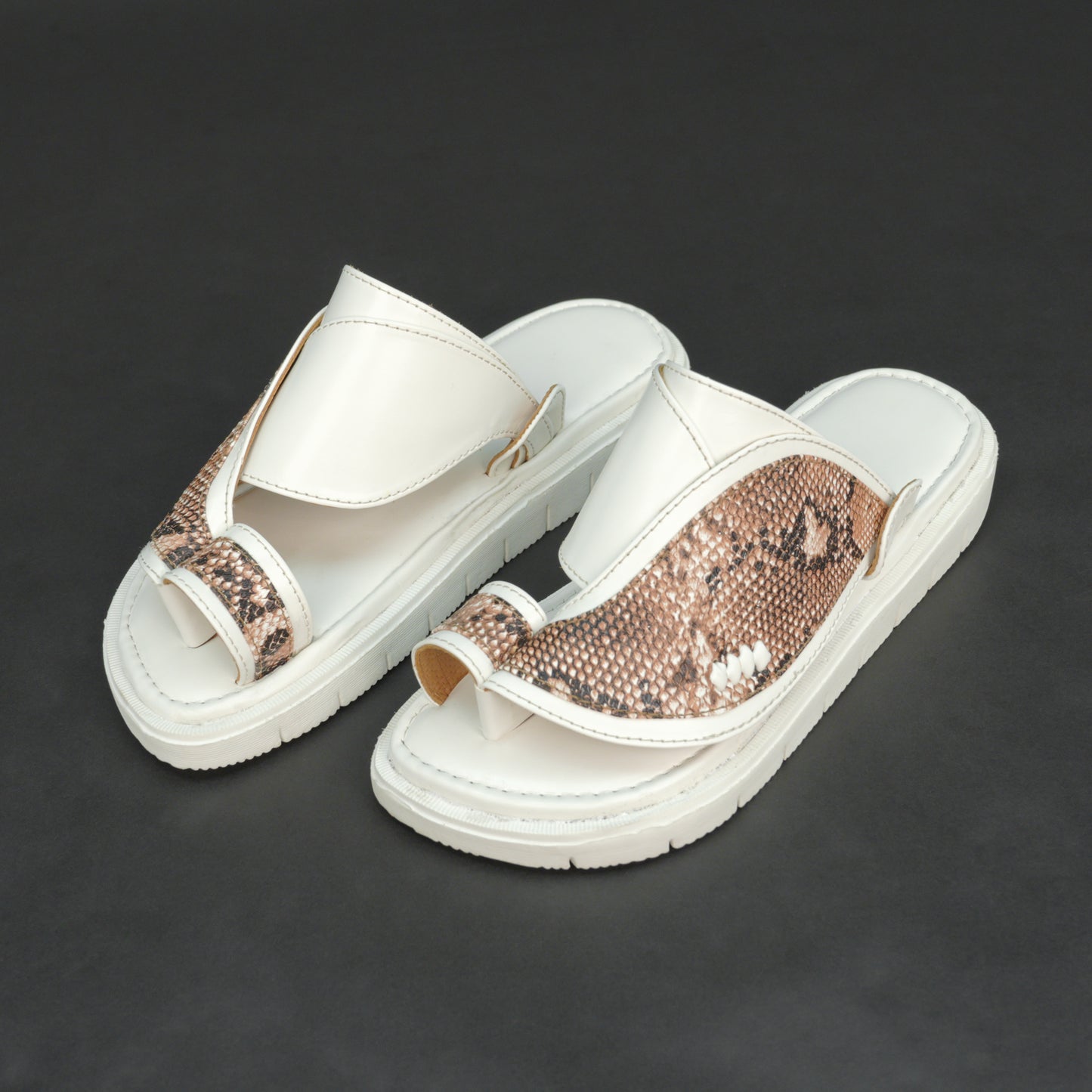 White Arabic chappal with snake-pattern PU upper and EVA sole.
