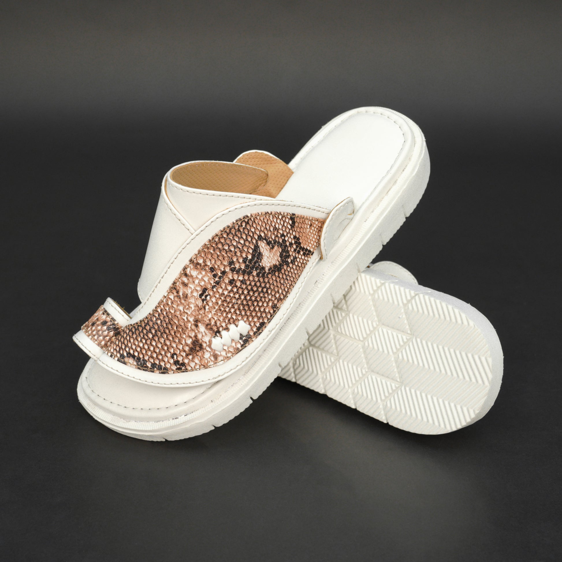 White Arabic chappal with snake-pattern PU upper and EVA sole.