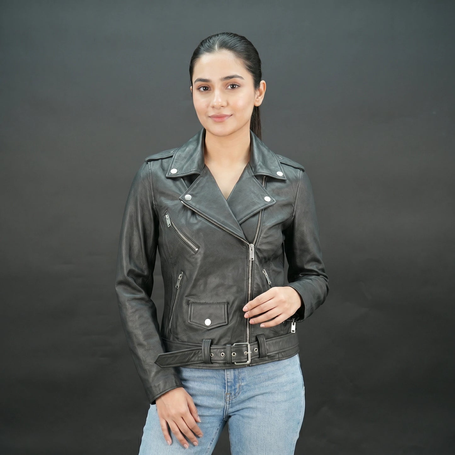 Black leather biker jacket with asymmetrical zip and belt, slim fit design.