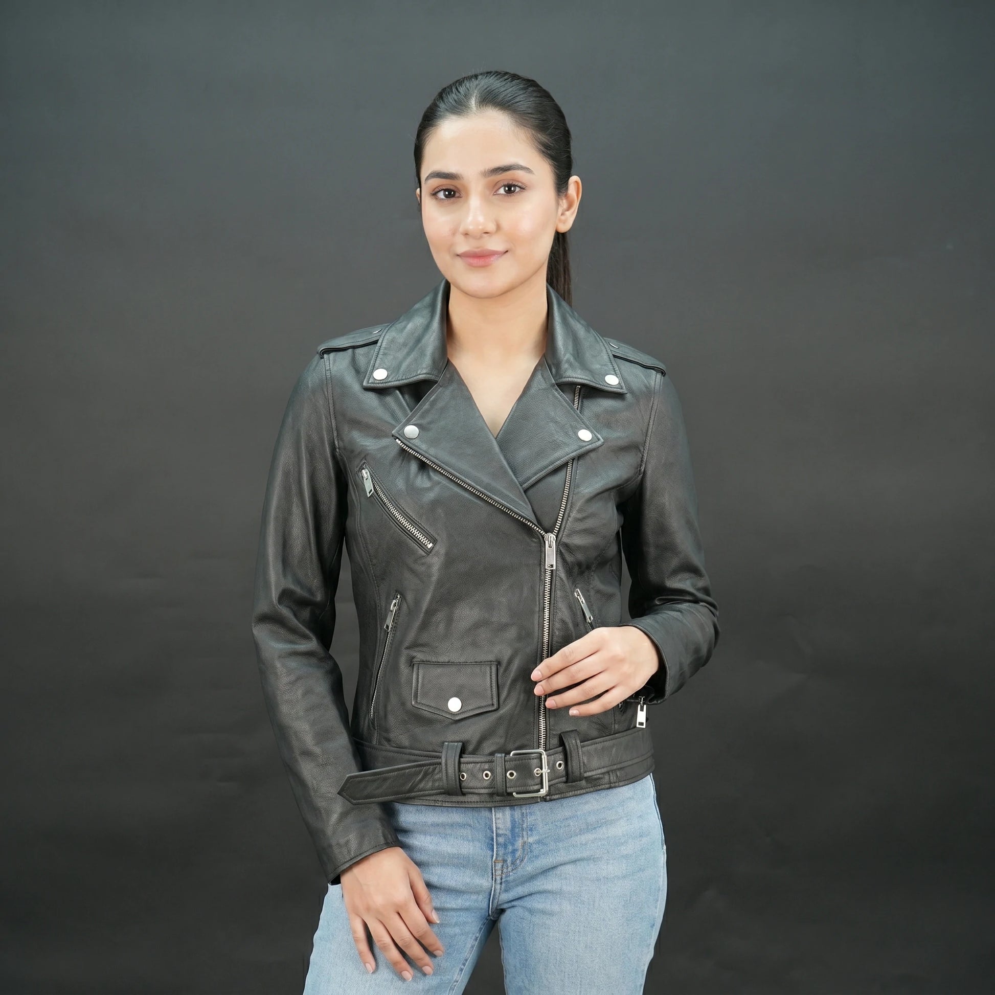 Black leather biker jacket with asymmetrical zip and belt, slim fit design.
