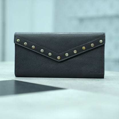 Black leather clutch with three main compartments, one zip pocket, and three card pockets for organized storage