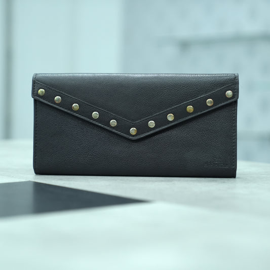 Black leather clutch with three main compartments, one zip pocket, and three card pockets for organized storage