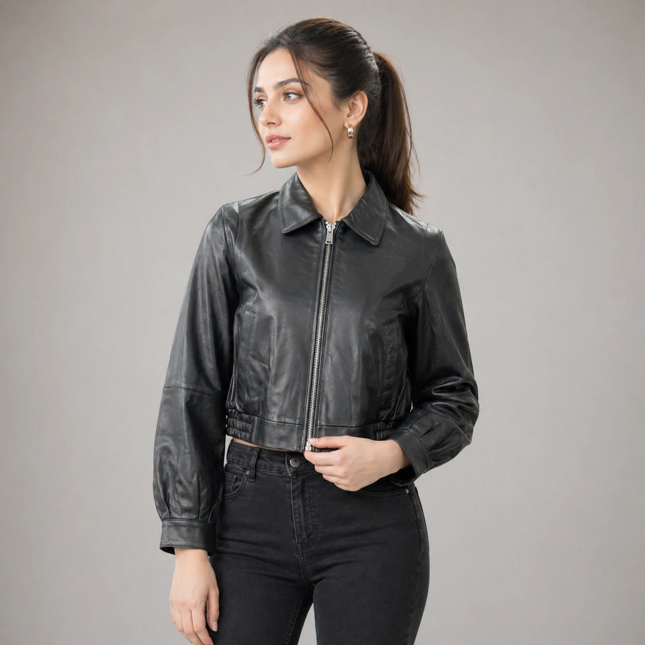 Women black cropped leather jacket with ribbed hem and side pockets
