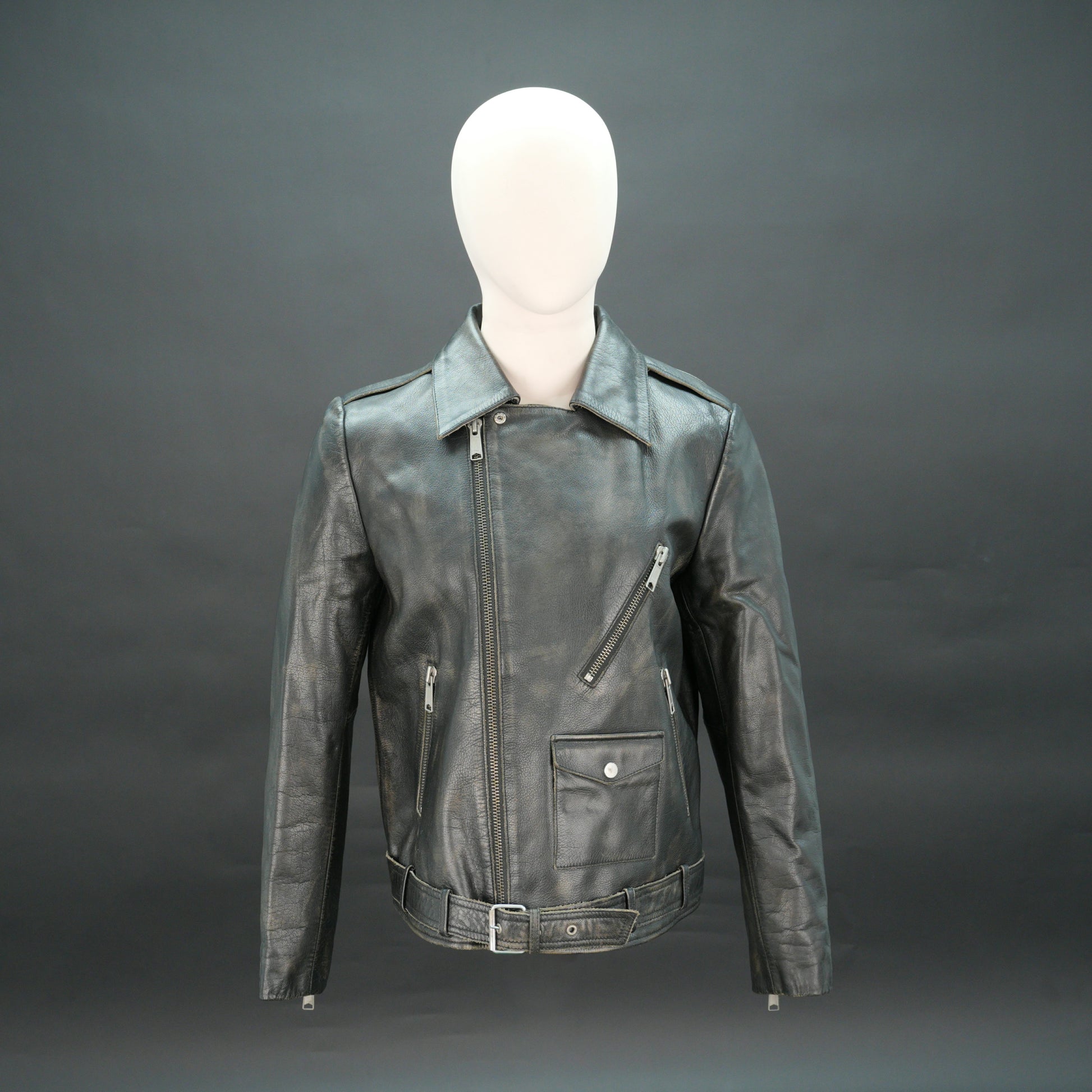 Black leather moto jacket with asymmetric zip and slim fit.