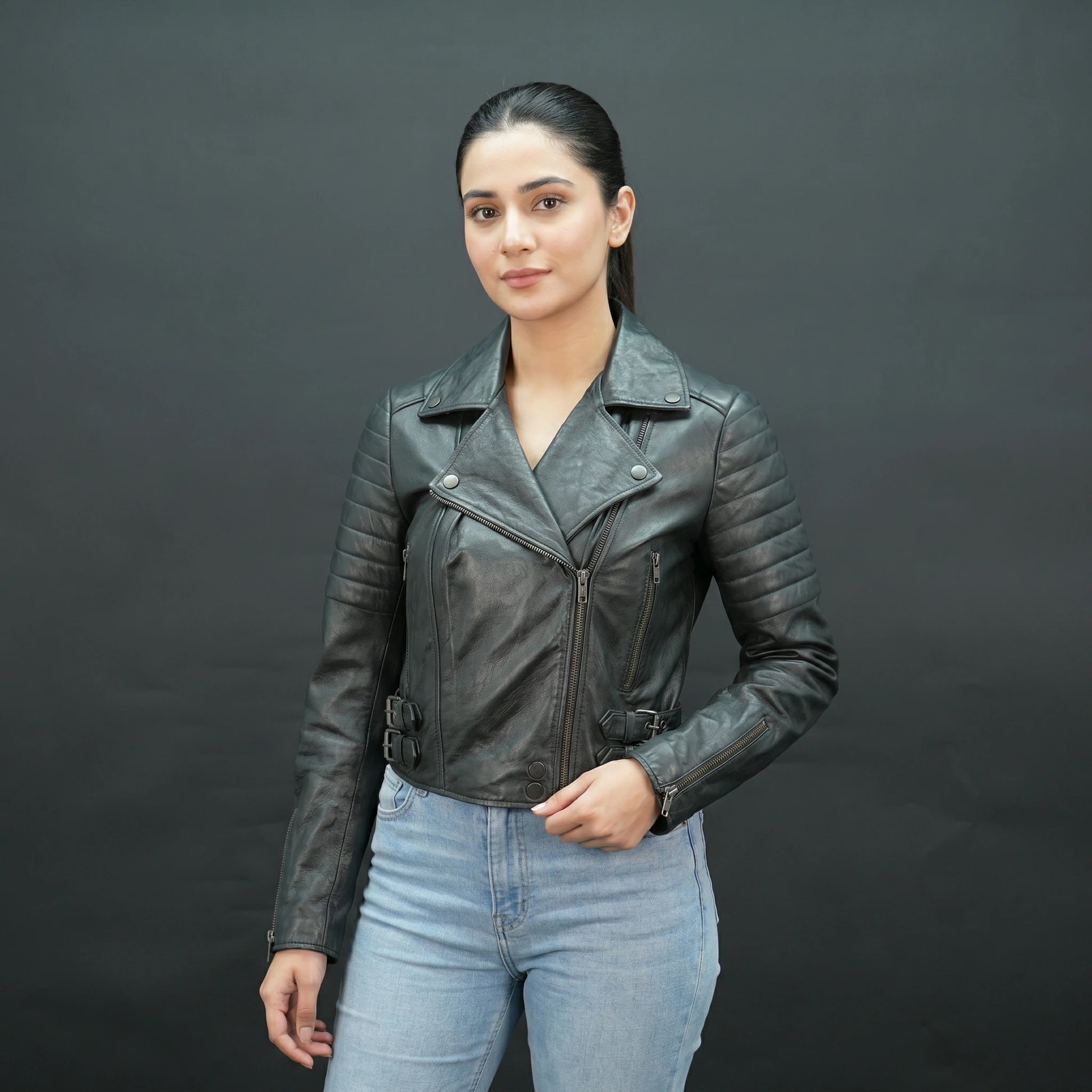 Black leather biker jacket with lapel collar and asymmetrical zip.