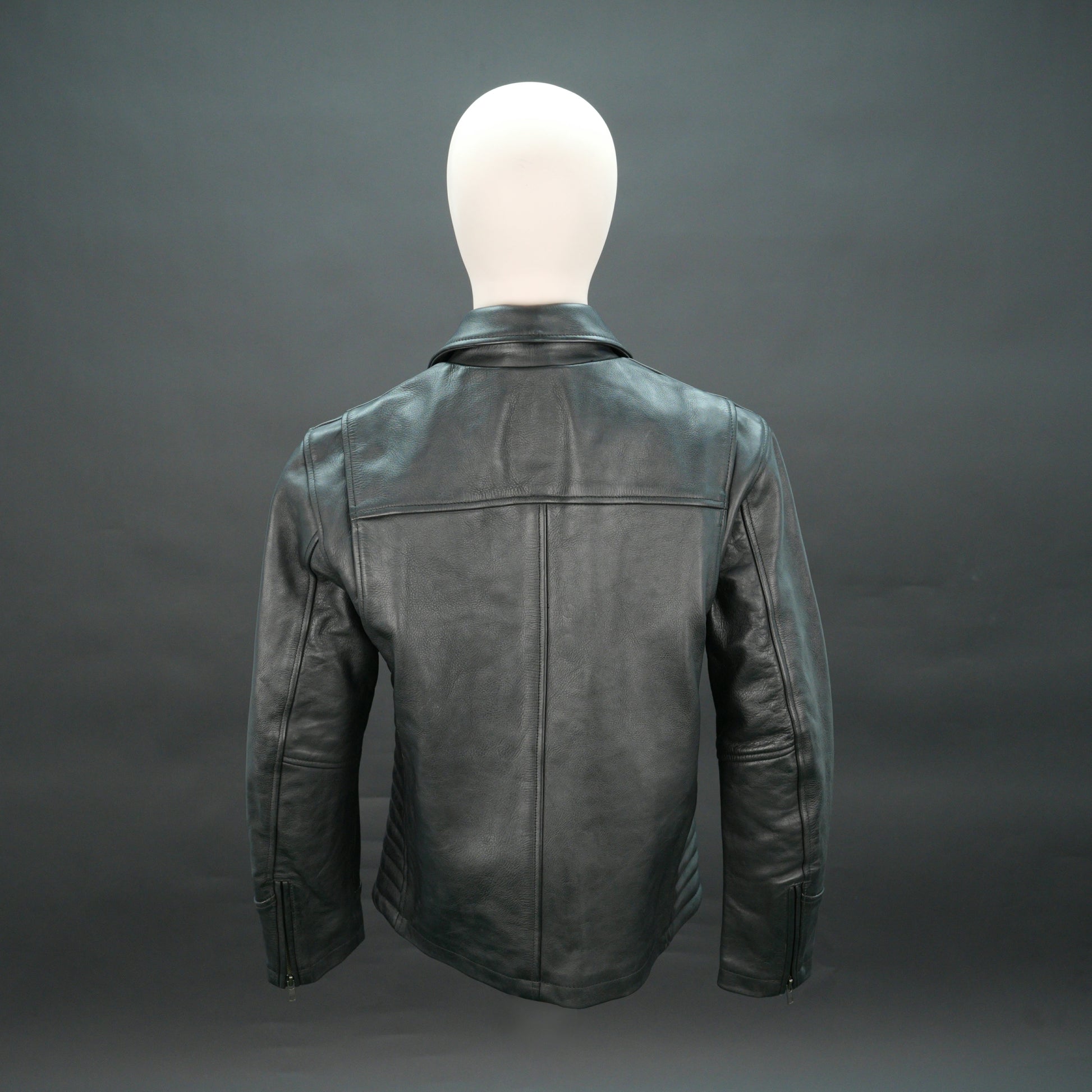 Black leather biker jacket with quilted design, slim fit, and zip closure.