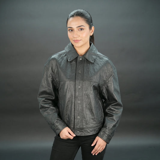 Women black leather trucker jacket with shirt collar and button closure