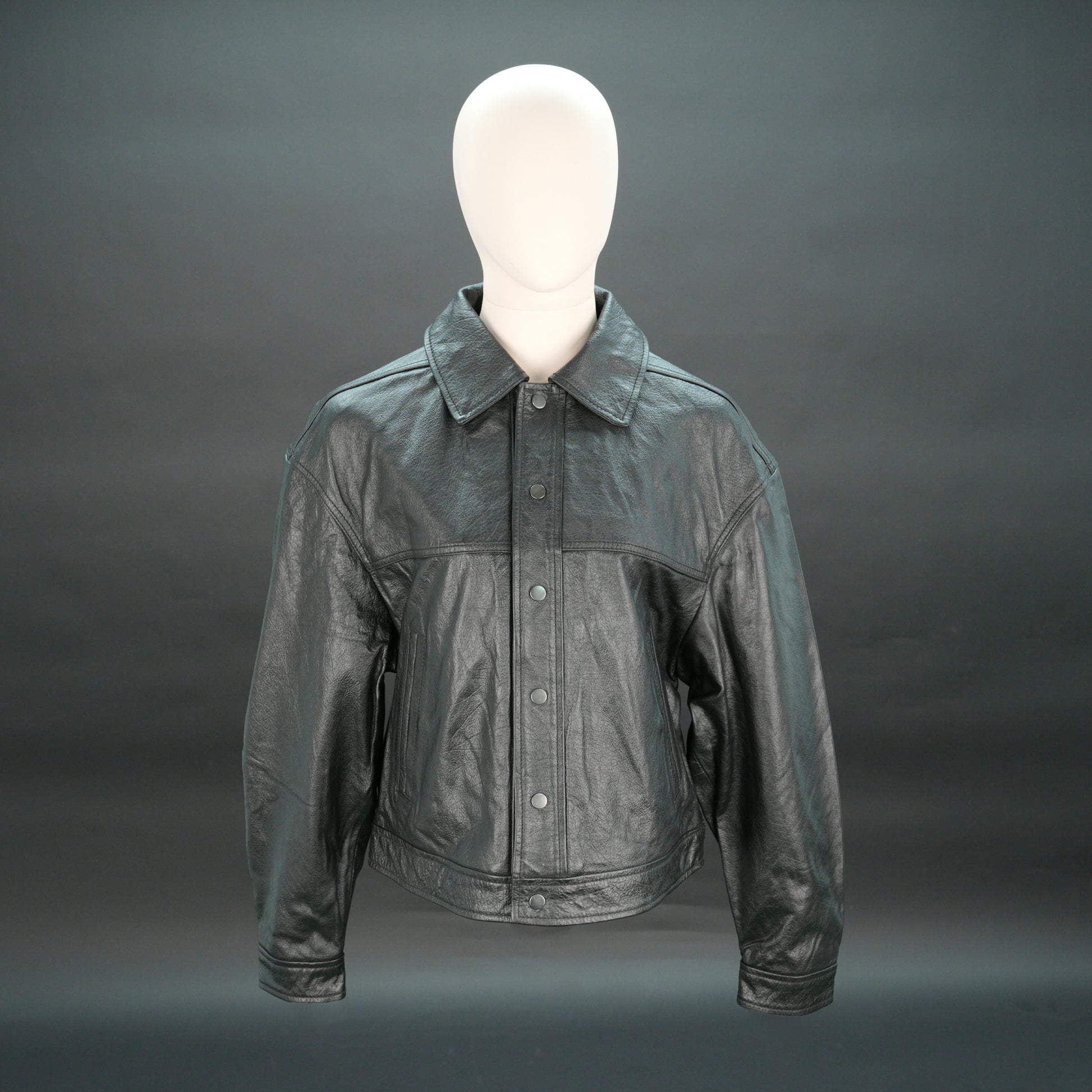 Women black leather trucker jacket with shirt collar and button closure