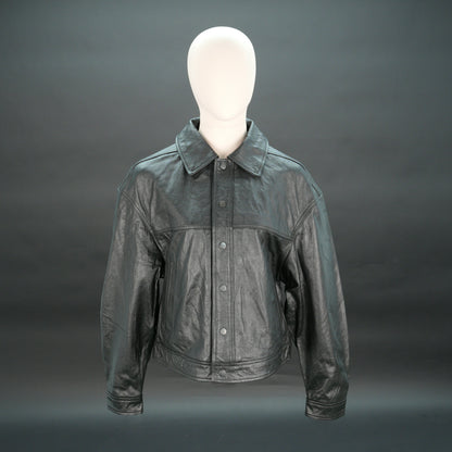 Women black leather trucker jacket with shirt collar and button closure