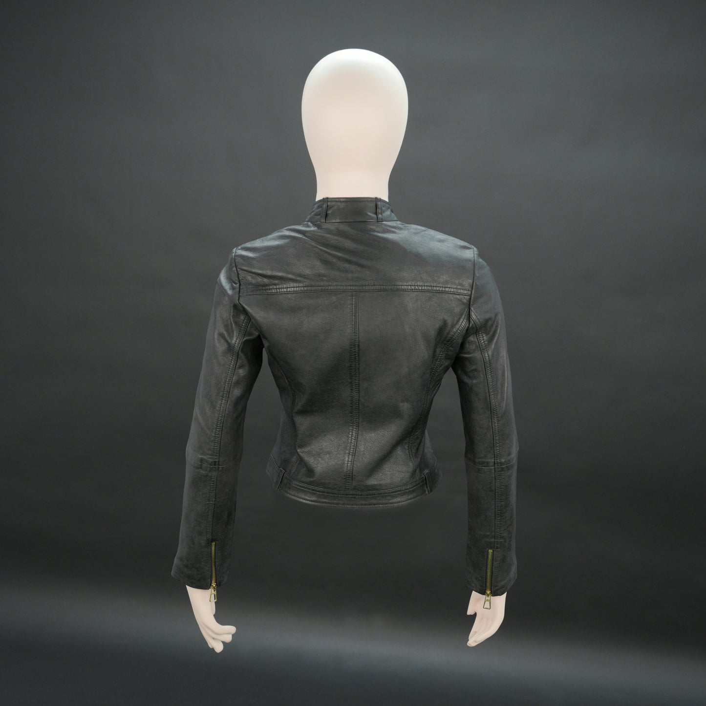 Women black biker leather jacket with gold zip pockets and tailored fit