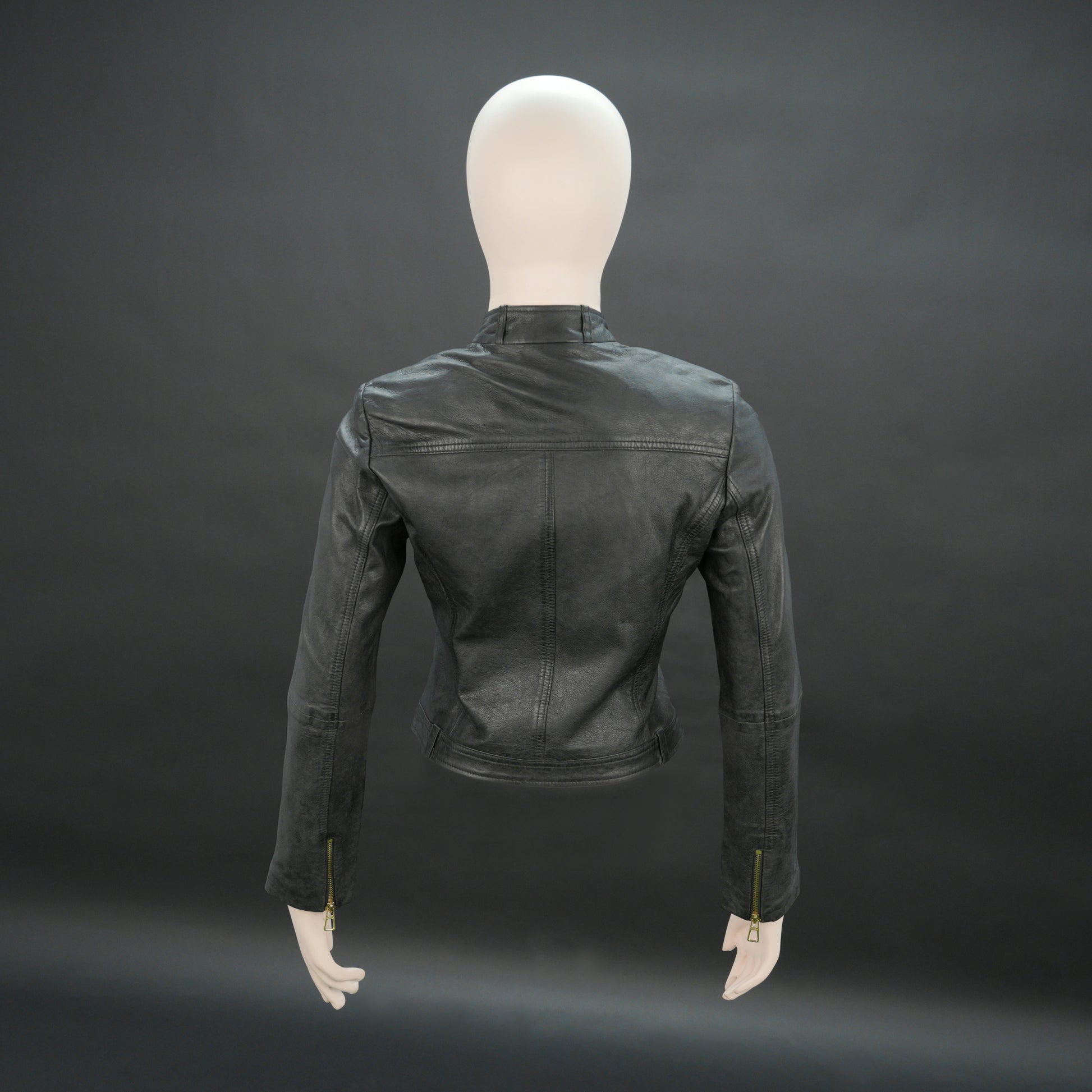 Women black biker leather jacket with gold zip pockets and tailored fit