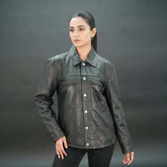 Black leather jacket with spread collar, button closure, and relaxed fit.