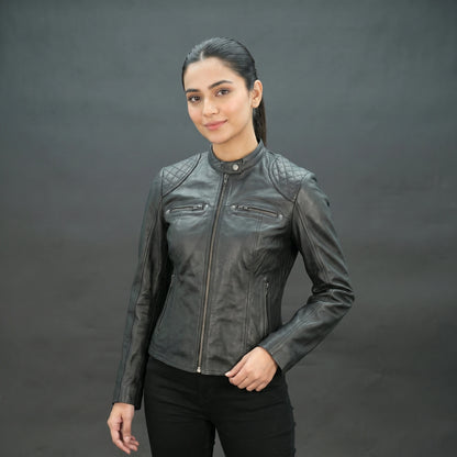 Black lambskin leather biker jacket with quilted shoulders.