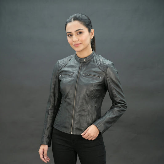 Black lambskin leather biker jacket with quilted shoulders.