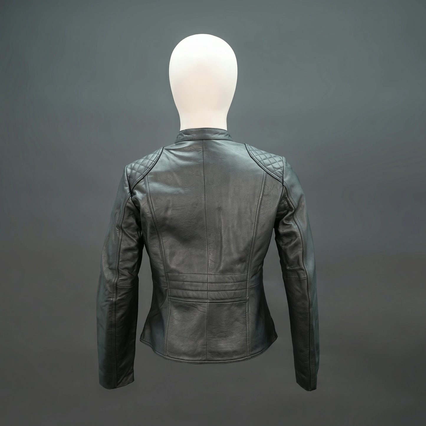 Black lambskin leather biker jacket with quilted shoulders.