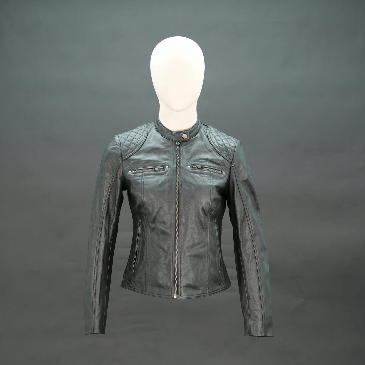 Black lambskin leather biker jacket with quilted shoulders.