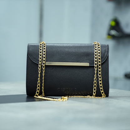Classic black leather crossbody bag with long chain strap and two open pockets—stylish, durable, and perfect for both casual and formal occasions.