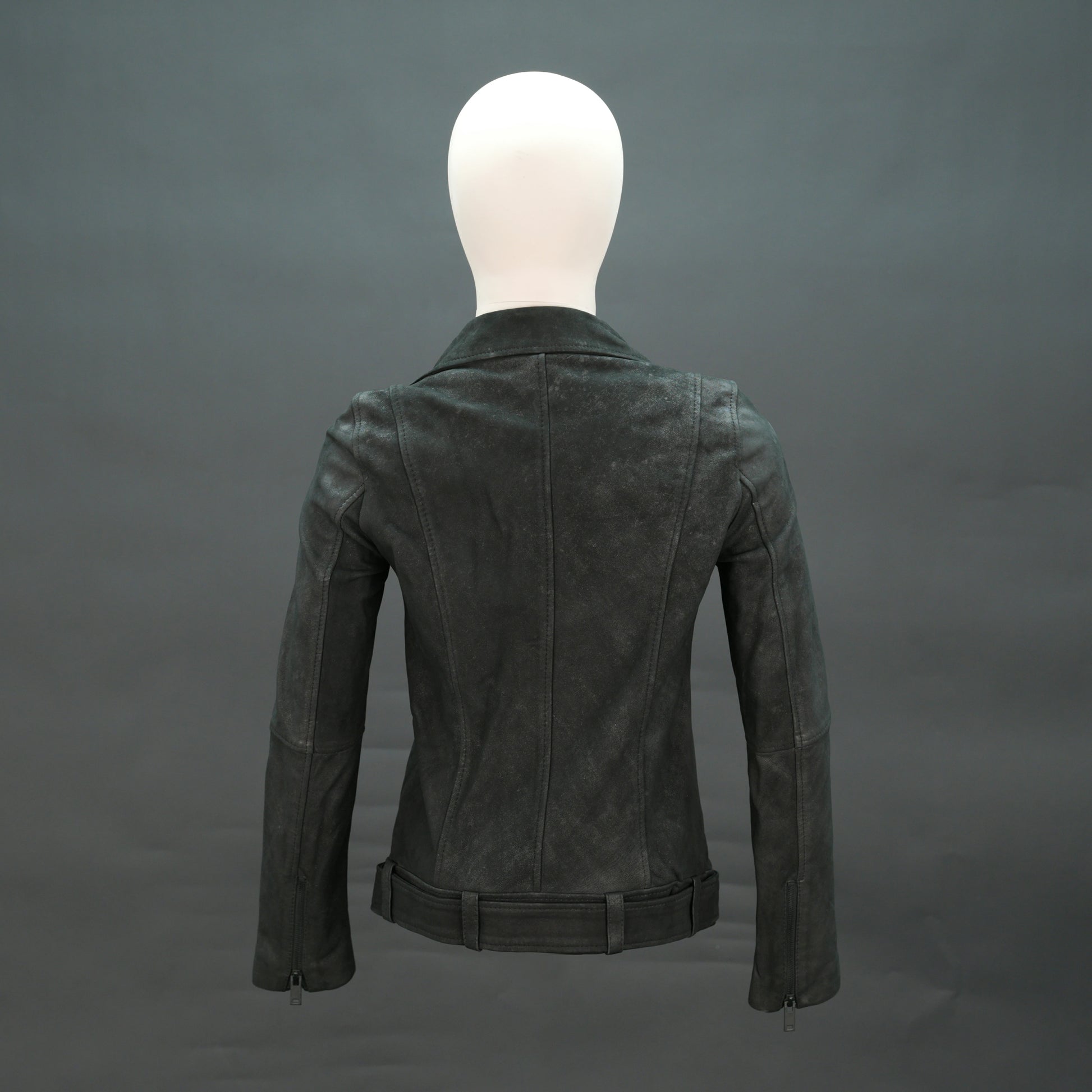 Black distressed leather biker jacket with asymmetrical zip and waist belt.