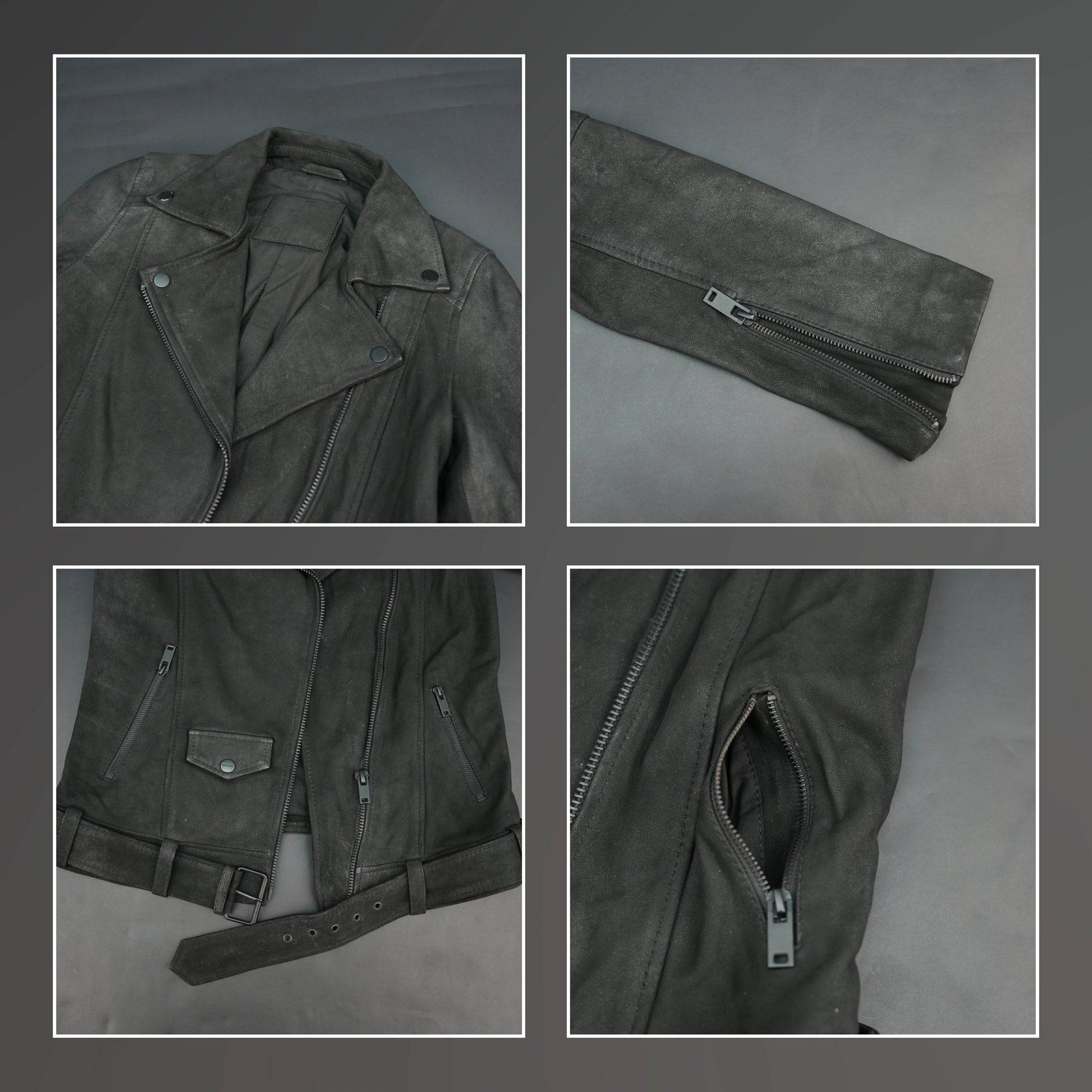 Black distressed leather biker jacket with asymmetrical zip and waist belt.