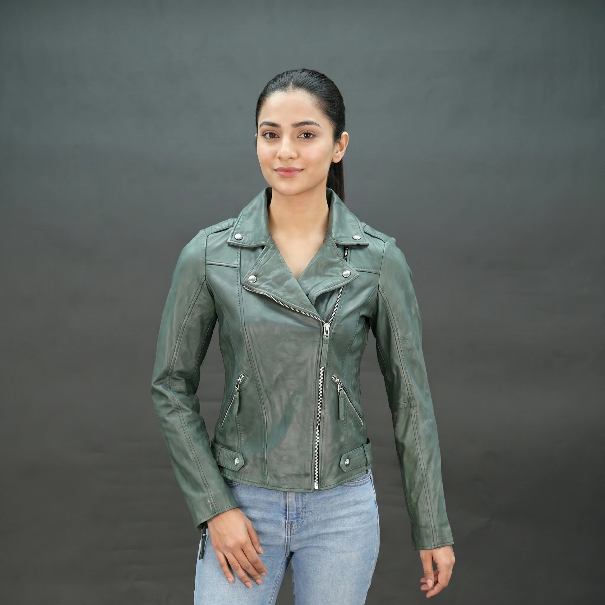 Green lambskin leather biker jacket with asymmetrical zip and slim fit.