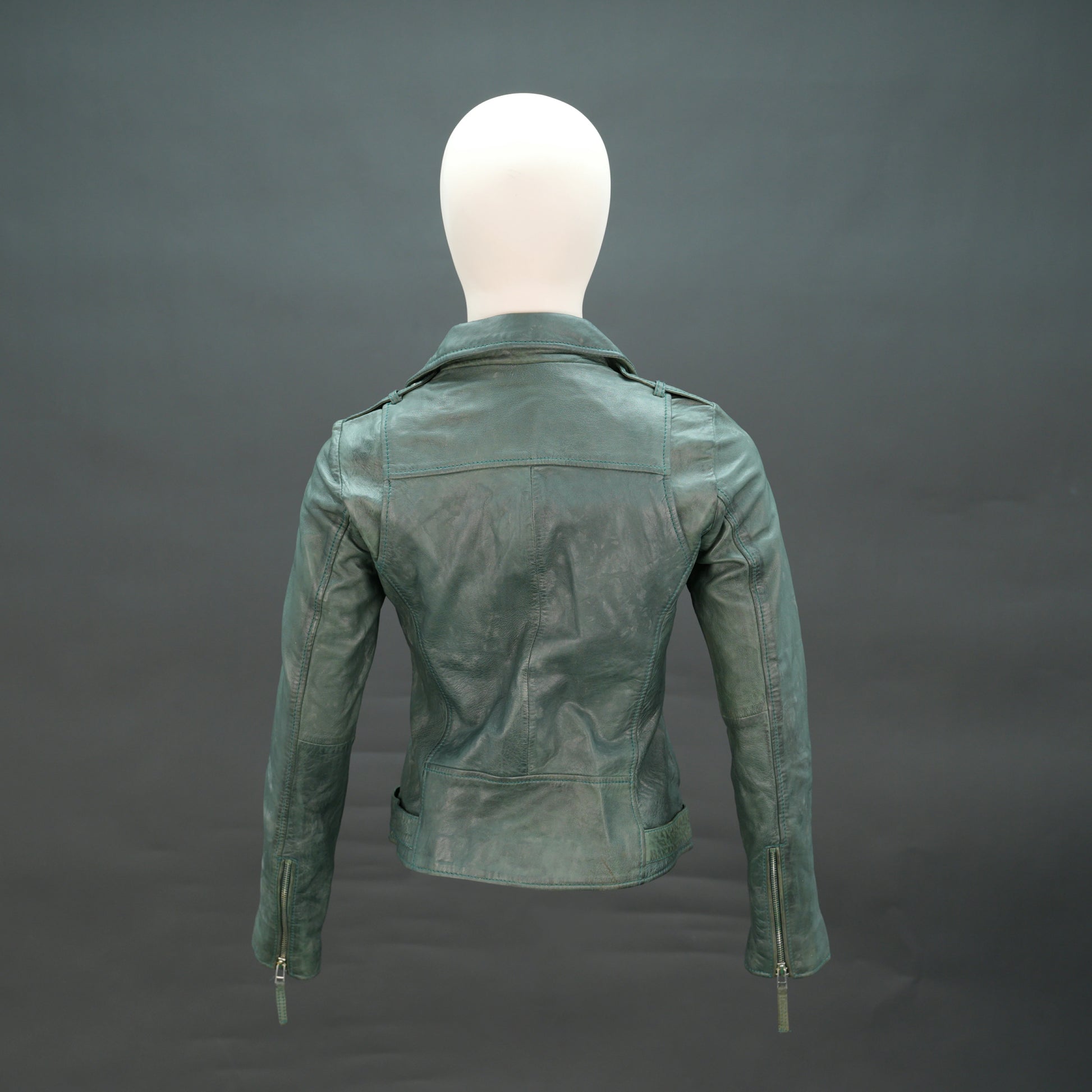 Green lambskin leather biker jacket with asymmetrical zip and slim fit.