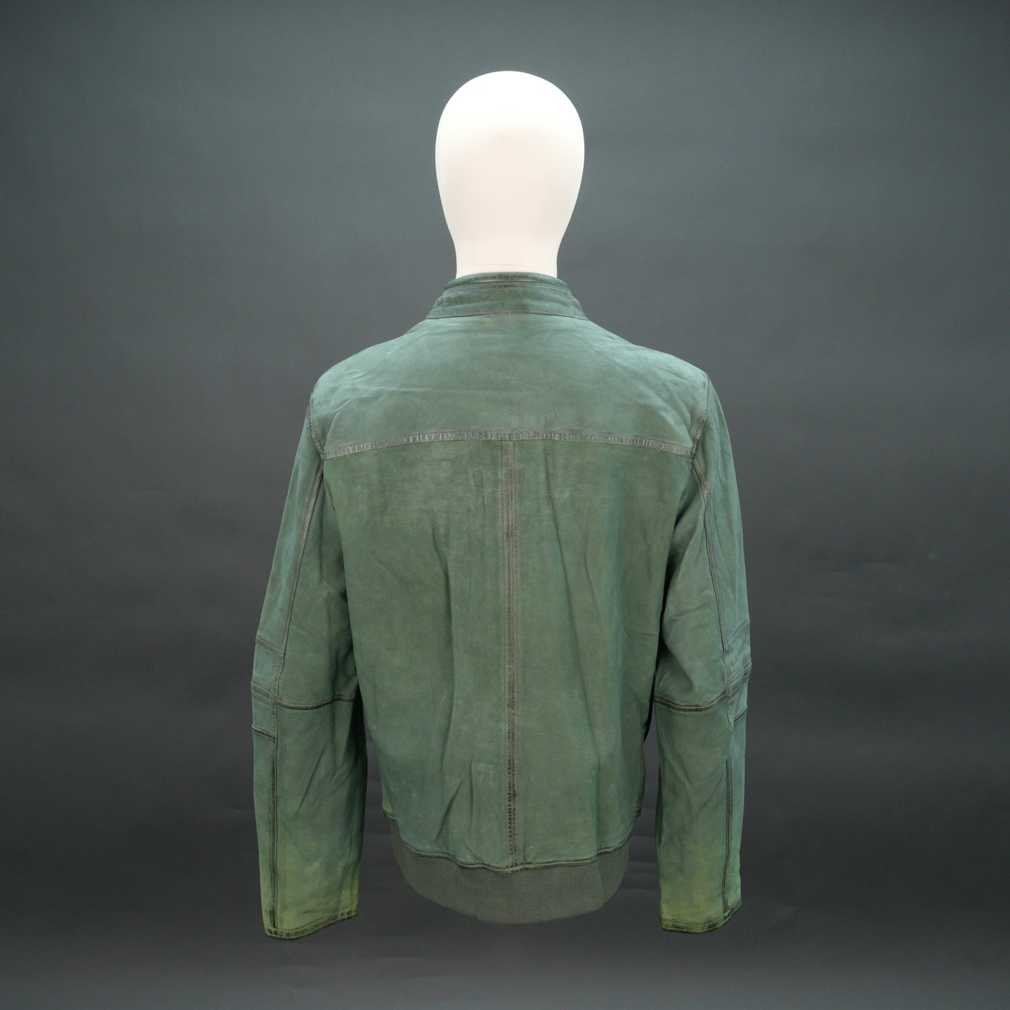 Green leather jacket with mandarin collar, zip closure, and slim fit.