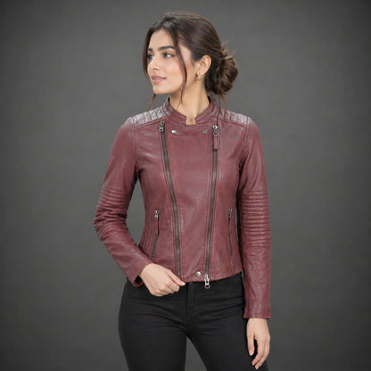 Women maroon leather biker jacket with quilted shoulders and front zip.