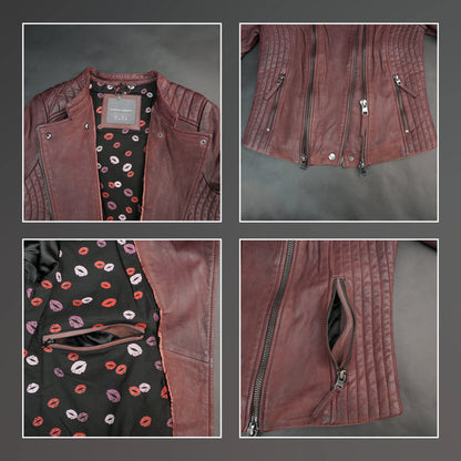 Women maroon leather biker jacket with quilted shoulders and front zip.