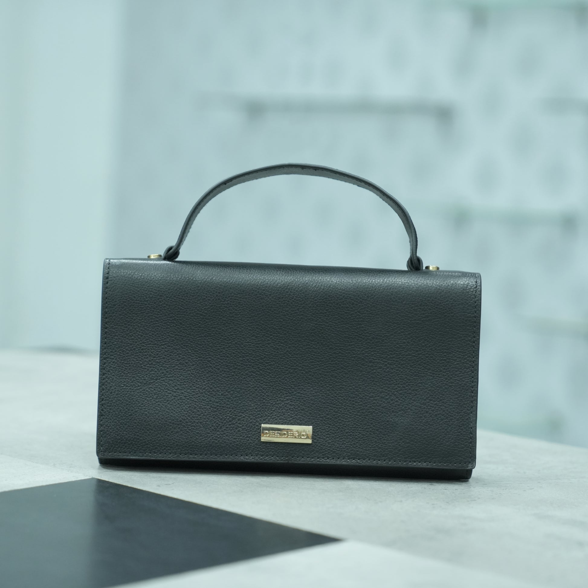 Leather grab handle bag with two open pockets, durable construction, and versatile design for everyday use
