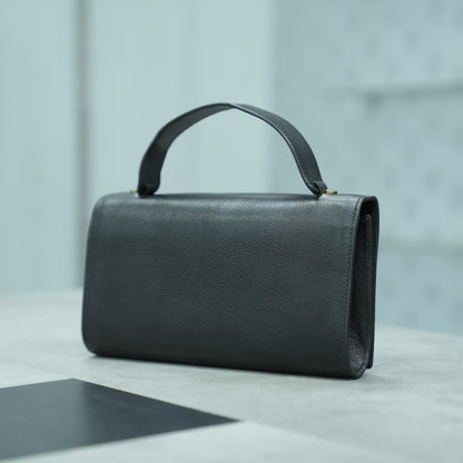 Leather grab handle bag with two open pockets, durable construction, and versatile design for everyday use
