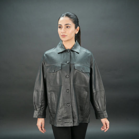 Black leather jacket with button closure, flap pockets, and relaxed fit.