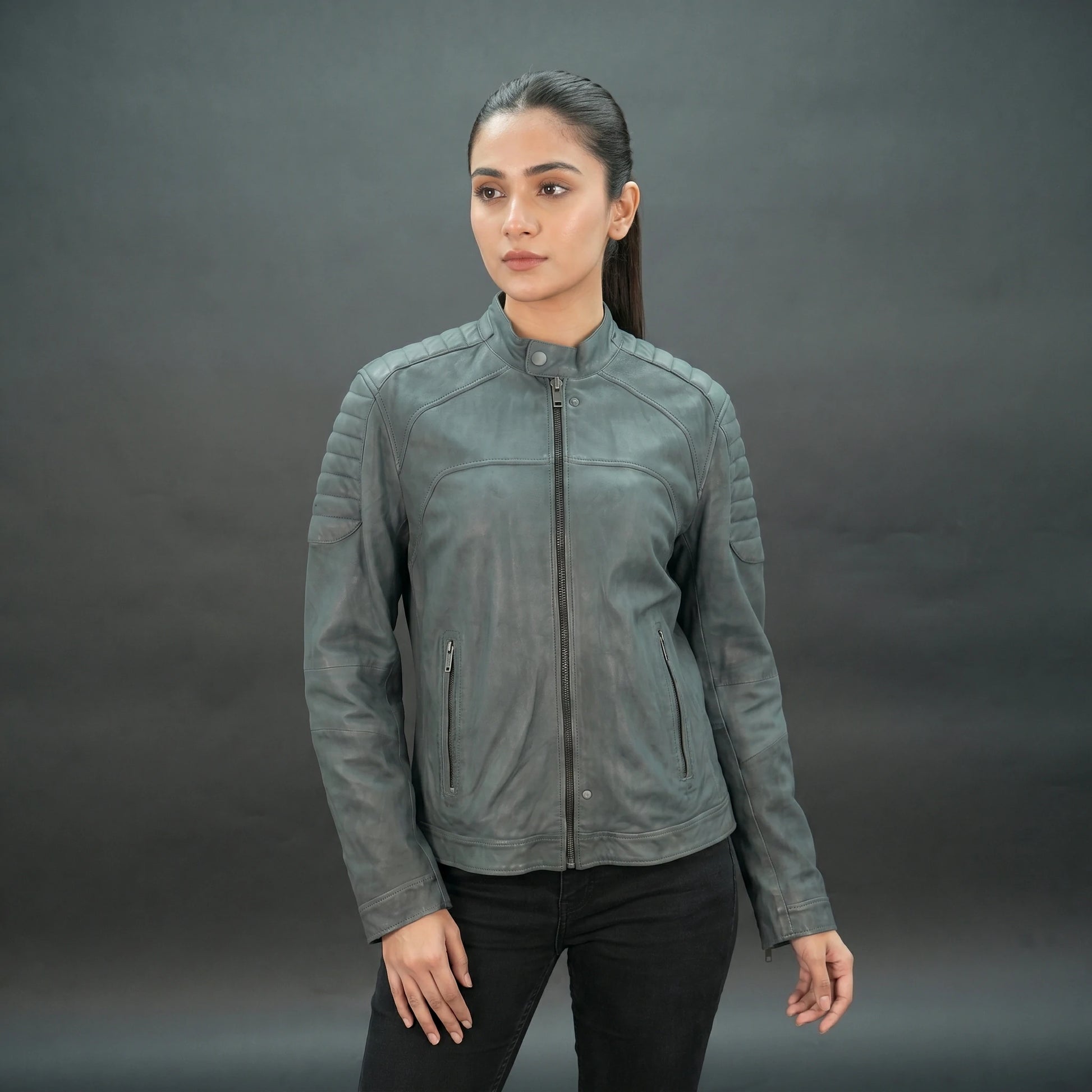 Grey leather jacket with stand collar, quilted shoulders, and slim fit.