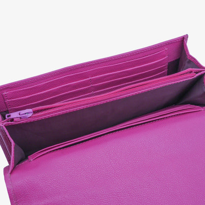 Pink leather clutch with three compartments, sixteen card slots, a zip pocket, cash compartment, and key for security