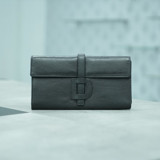 Black leather mini clutch with three compartments, sixteen card slots, and zip pocket, compact and elegant