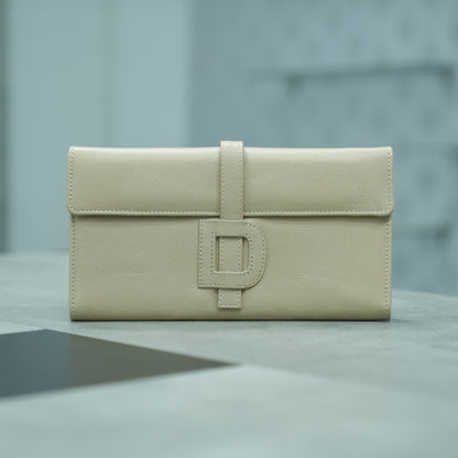 Beige leather mini clutch with three compartments, sixteen card slots, and a zip pocket