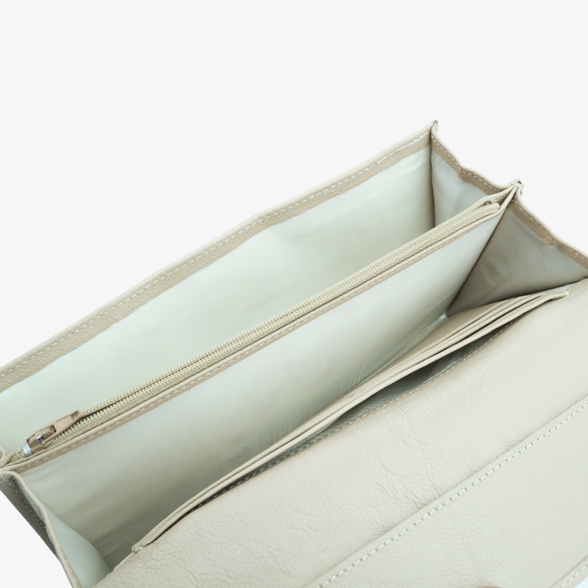 Beige leather mini clutch with three compartments, sixteen card slots, and a zip pocket