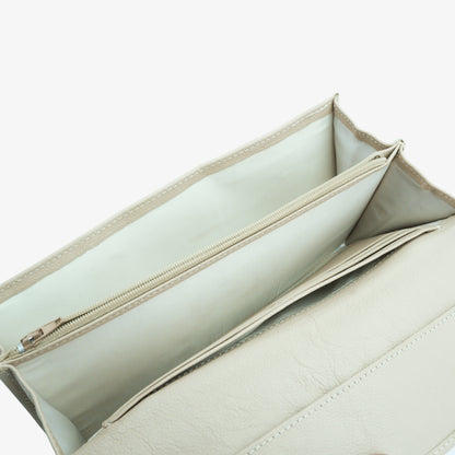 Beige leather mini clutch with three compartments, sixteen card slots, and a zip pocket