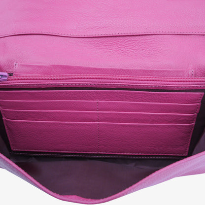 Compact pink leather mini clutch with three compartments, sixteen card slots, and zip pocket, combining sleek design with everyday functionality