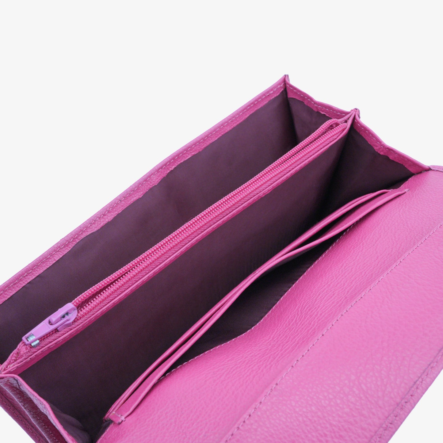 Compact pink leather mini clutch with three compartments, sixteen card slots, and zip pocket, combining sleek design with everyday functionality