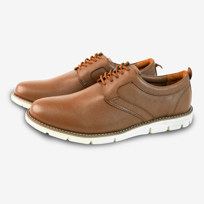 Tan footwear with genuine cow leather milled commute upper, soft sheep lining, Taxon insole for support, and lightweight EVA sole for flexible traction